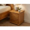 Noční stolek z masivu u postele Mega Supra