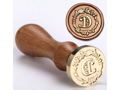 pečetidlo s písmenem D a rukojetí