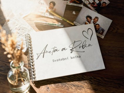 freepik photo a white spiralbound book with aneta a robin 6362322