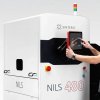 NILS 480 indutrial sls 3d printer with engineer 1024x1024.webp