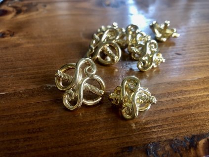 Luxusní zlatý knoflík ve tvaru uzlíku, 90-leta