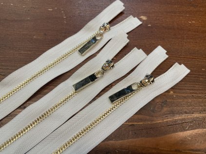Bílý dělitelný zip se zlatým kovem, 50cm