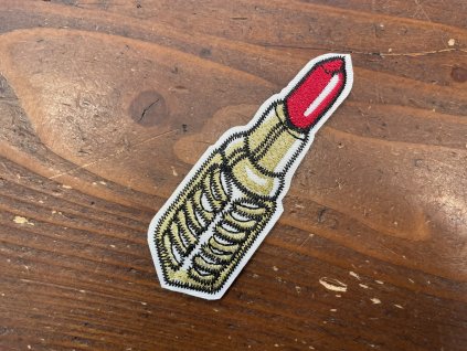 Nažehlovací aplikace ve tvaru rtěnky