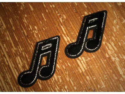 Plastická aplikace ve tvaru noty