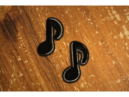 Plastická aplikace ve tvaru noty