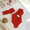 VeronPupi Newborn clothing set placed on a shelf top view keep 4b9f9c7c 3e1d 4c4f 877b a527a4451fa5