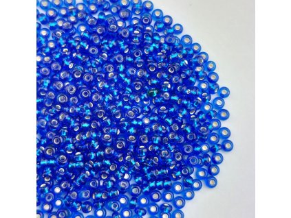 Preciosa rokajl 8/0 tm. modrý průtah