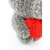 Šedý stojící medvídek z růží s červeným srdcem