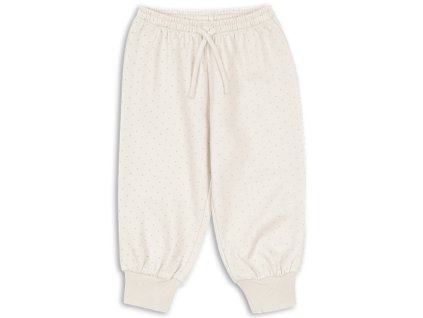 Dětské tepláky v krémové barvě s puntíky od Konges Sløjd