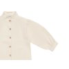 Dívčí košile z měkoučké džínoviny v krémovém provedení od Donsje s knoflíčky a límečkem