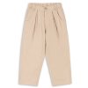 Dětské béžové kalhoty volné střihu pro holky i kluky od Konges Sløjd