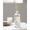 Vonný difuzér v lahvičce z čirého skla s ratanovými tyčinkami od Meraki