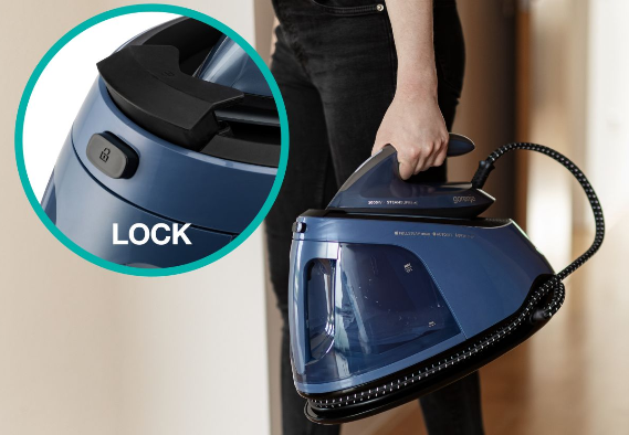 ámkom upevnite žehličku k stanici a oba káble uložte do otvoru v spodnej časti.