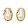 Sculptural Pearl Earrings in a Gold Frame