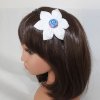 Dětská čelenka do vlasů, černá s bílo modrým květem