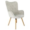 Světle šedé sametové křeslo COZY s dřevěnými nohami