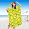 Letní plážový set LEMONS – zelené pončo a osuška pro pohodlí