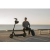 Ninebot KickScooter MAX G2 Lifestyle picture Man sitting KickScooter standing