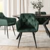 Scaun de dining din velur verde Modesto în cameră