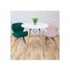 zelená a ružová stolička s drevenými nohami pri bielom stole