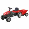 červený šliapací traktor s prívesom