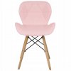 ružová kožená stolička s drevenými nohami železnou konštrukciou