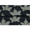Teplákovina s motívom listov v čiernej farbe s prekladom látky