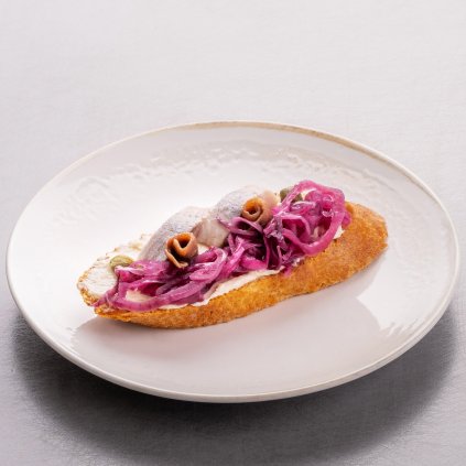 Gluten-free open sandwich with anchovies and herring