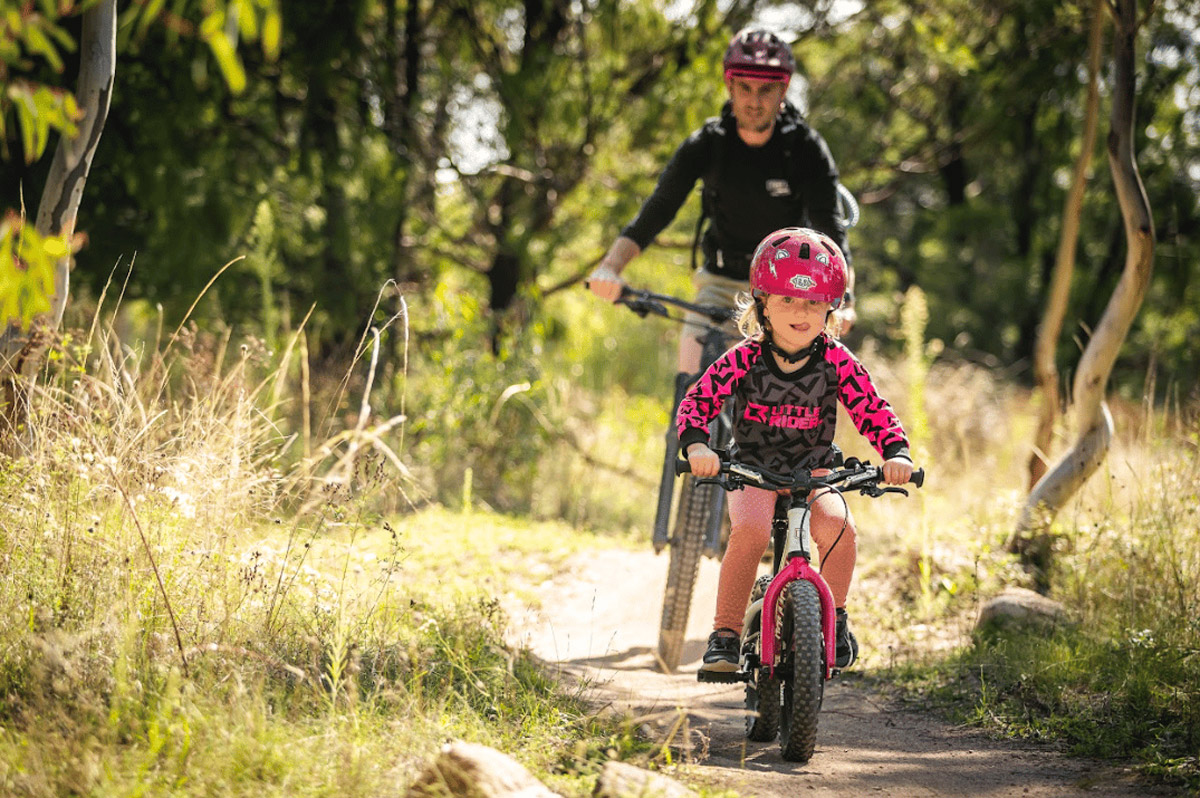 A child enjoying a bike ride