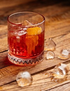 front-view-fruit-cocktail-with-ice-cubes-brown-wooden-desk-cocktail-drink-juice_462x600_385x500_231x300