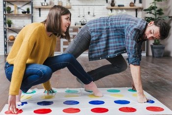 cute-toddlers-playing-twister-game-home_599x400_449x300_350x234