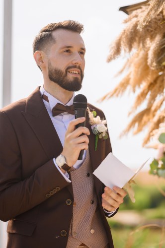 stylish-man-with-microphone-talking-speech-wedding-day_332x500
