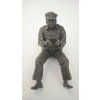 Sitting tractor driver
