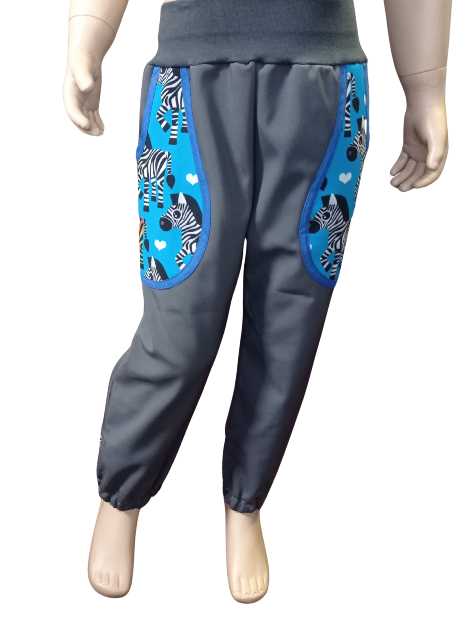 Abeli Softshellové kalhoty s flísem šedé, zebry modré Velikost: 98 s nápletem v nohavici