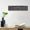 Kovová cedule  Wonderland.  40 x 10 cm