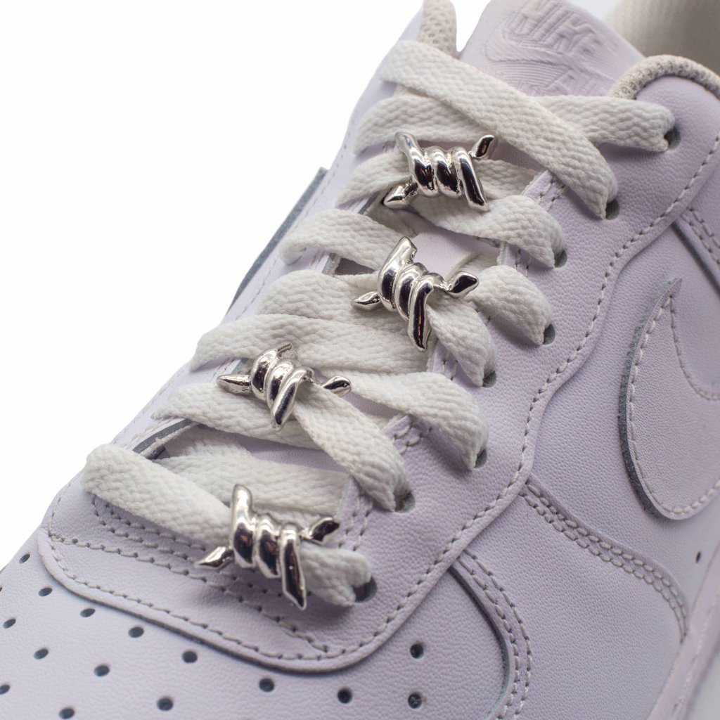 Key details Material: zinc alloy, smooth silver finish Hole diameter: 0.5 cm (fits common lace widths) Pack options: 6 pcs or 8 pcs Use with: SneakerGear laces or any flat laces you prefer Fit: universal — suitable for all shoe types Why it hits Small hardware, big attitude. Mix multiples across rows for a loud look or keep a minimal pair near the top eyelets.