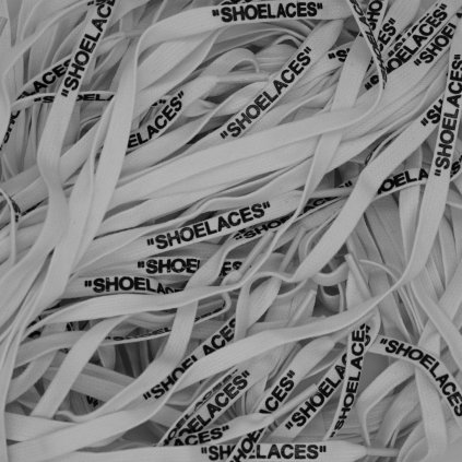 White Off-White flat waxed shoelaces with “SHOELACES” print — premium flat replacements for Nike Air Force 1, Air Jordan 1, Dunk and Air Max (Off-White collabs).