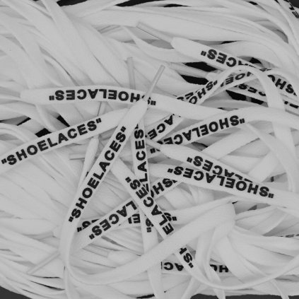 White Off-White flat replacement shoelaces with “SHOELACES” print — crisp flat profile for Nike Air Force 1, Air Jordan 1, Dunk and Air Max.