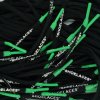 Black Off-White oval shoelaces with green tips — contrast oval laces for Nike Air Force 1, Air Jordan, Dunk and Air Max low-tops.