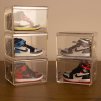 Transparent sneaker display box with a pair of shoes inside