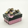 3D mini sneaker keychain in Dunk Low Cactus Jack style attached to keys