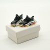 3D mini sneaker keychain in Triple S Bred style attached to keys