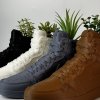 Lineup of AJ1 3D printed sneaker planters with artificial plants