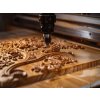 a CNC wood machine in action