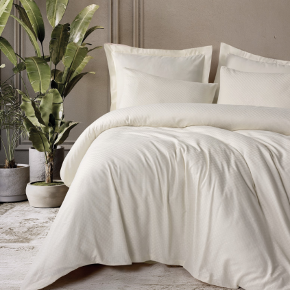 Bavlnené obliečky Krémové na posteli