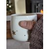 Porcelánový kalíšek se zlatými hvězdami