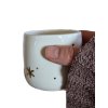 Porcelánový kalíšek se zlatými hvězdami