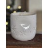 Porcelánová svíčka s prosvítajícími hvězdami a vánoční vůní