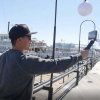 Horizontální a vertikální adaptér namontovaný na selfie