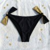 Zlato černé kalhotky s mašlemi